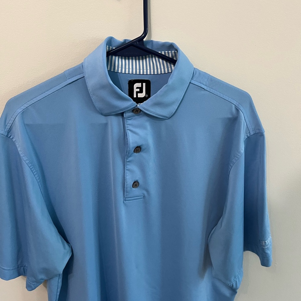 Footjoy polo medium. Fits a little larger though